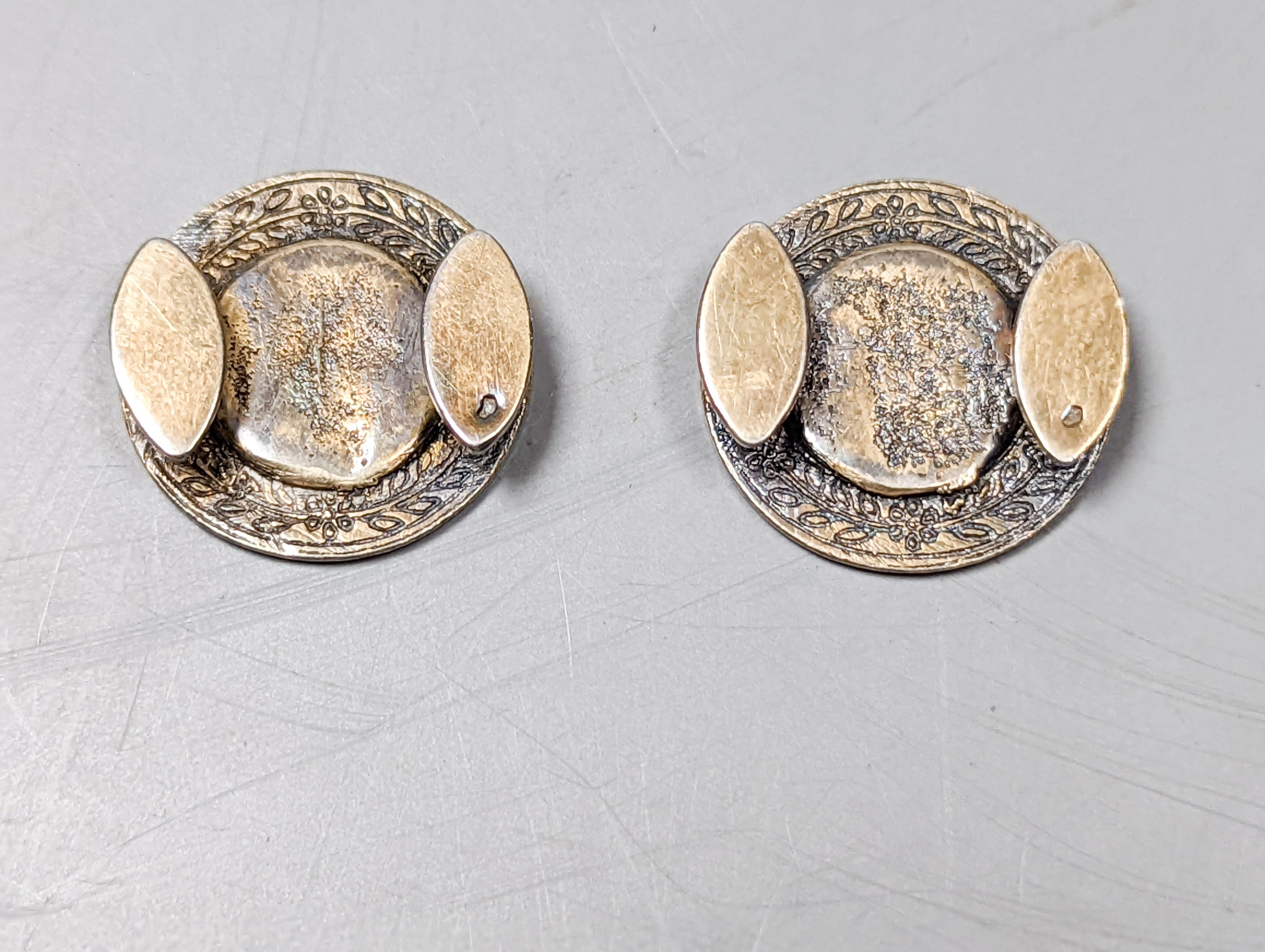 A pair of antique French white metal and enamel buttons, diameter 20mm.
